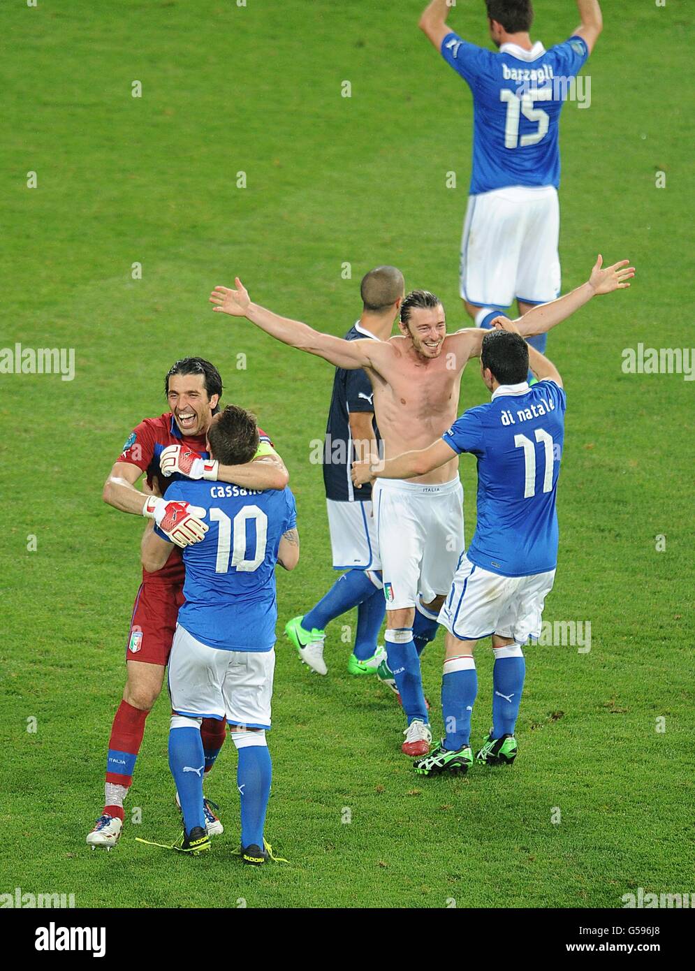 Italy goalkeeper Gianluigi Buffon (left) and Antonio Cassano (2nd left) celebrate with their team mates after the final whistle Stock Photo