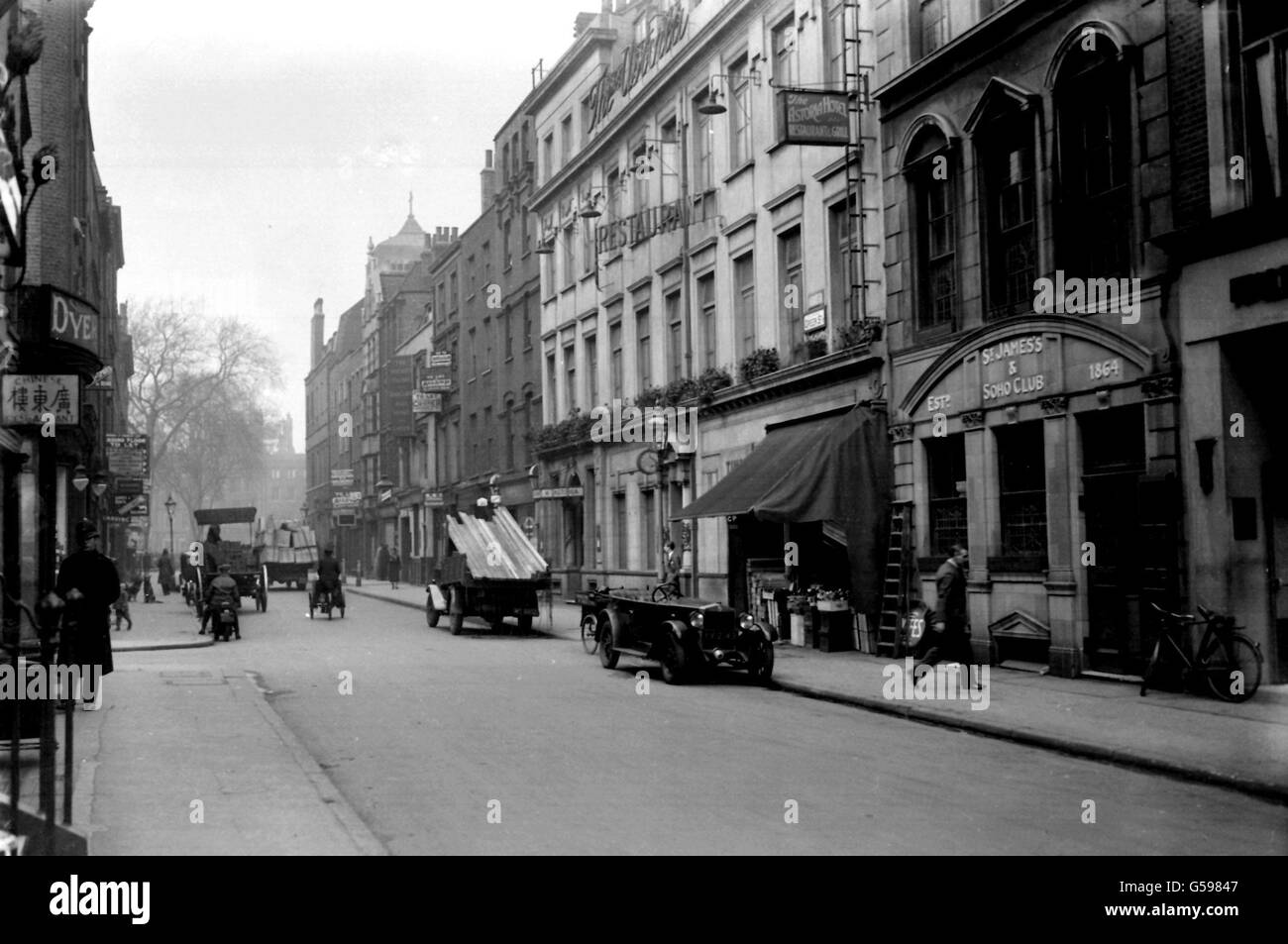 GREEK STREET, LONDON 1932: A view of Greek Street in the Soho area of London. Stock Photo