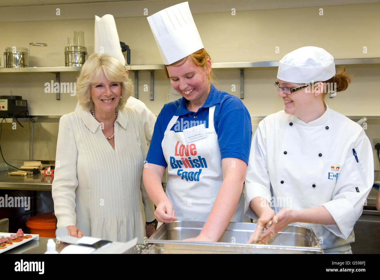 The Duchess of Cornwall in the kitchens at Buckingham Palace, in
