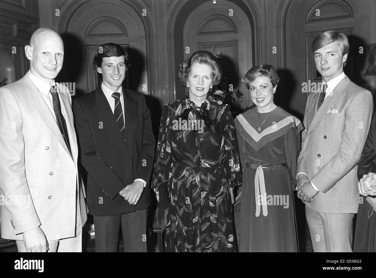 Britain's World Ice Dancing champions, Jayne Torvill and Christopher Dean, right, Olymic athletics champion Sebastian Coe and swimmer Duncan Goodhew, left, meeting Prime Minister Margaret Thatcher at the launch of a 'benefactors of Sports Aid Foundation' campaign, at a private reception at Les Ambassadeurs Club, London. Stock Photo
