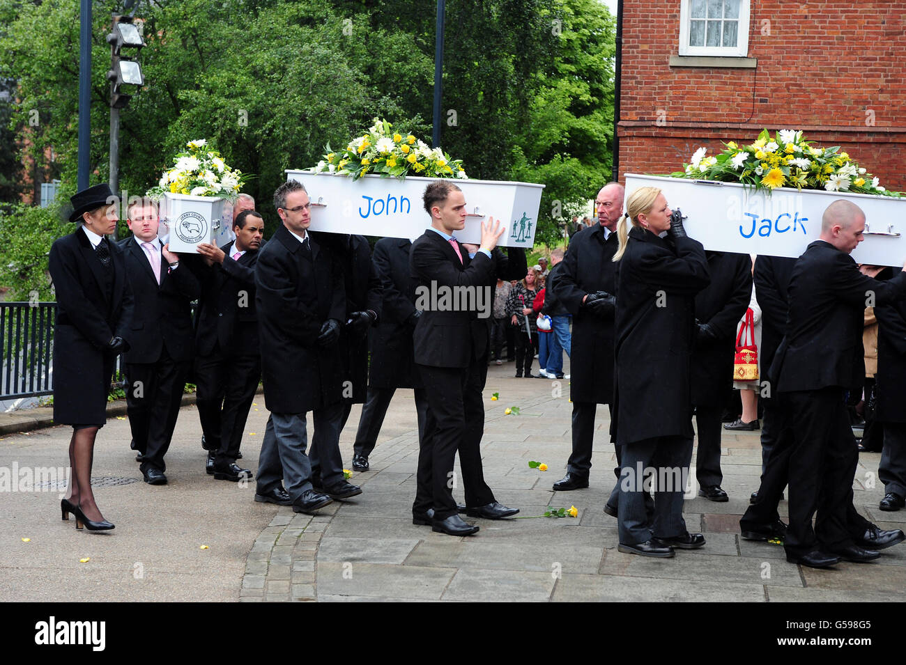 The funeral cortege of the Philpott children arrive at St Mary's RC