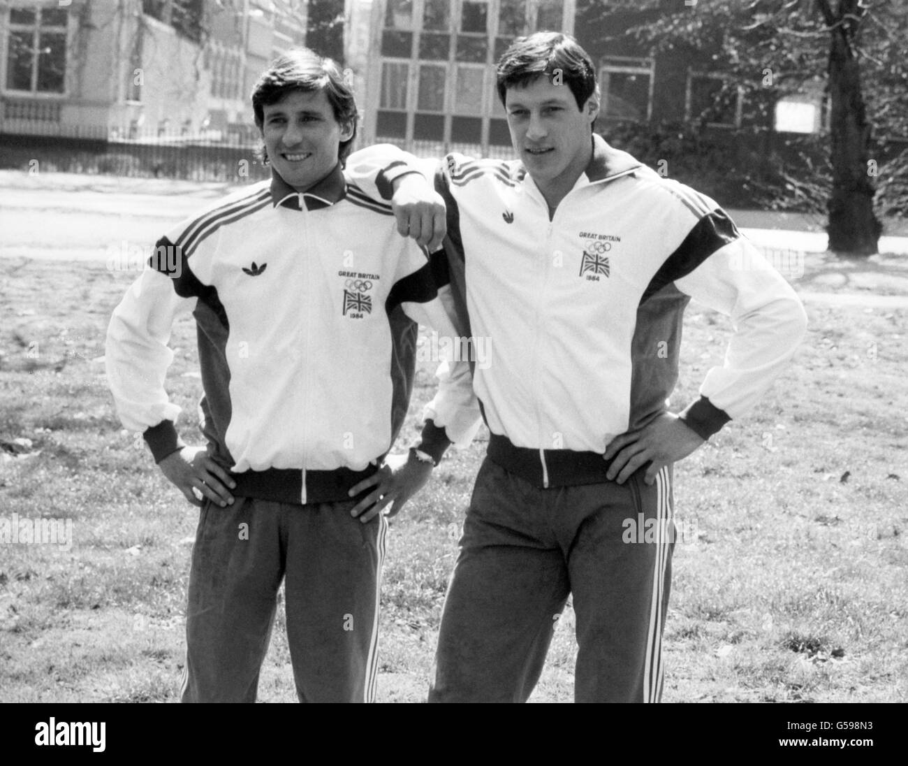 Olympic champions Sebastian Coe, left, and Alan Wells, wearing the new official British tracksuit for the Los Angeles 1984 Olympics. The tracksuit, called the 'Challenger' is specially designed by Adidas for the team. Stock Photo