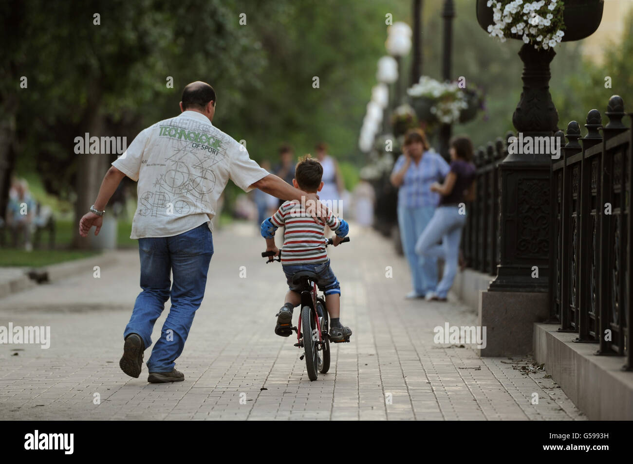 Travel Stock Ukraine. A young boy learns to ride a bicycle