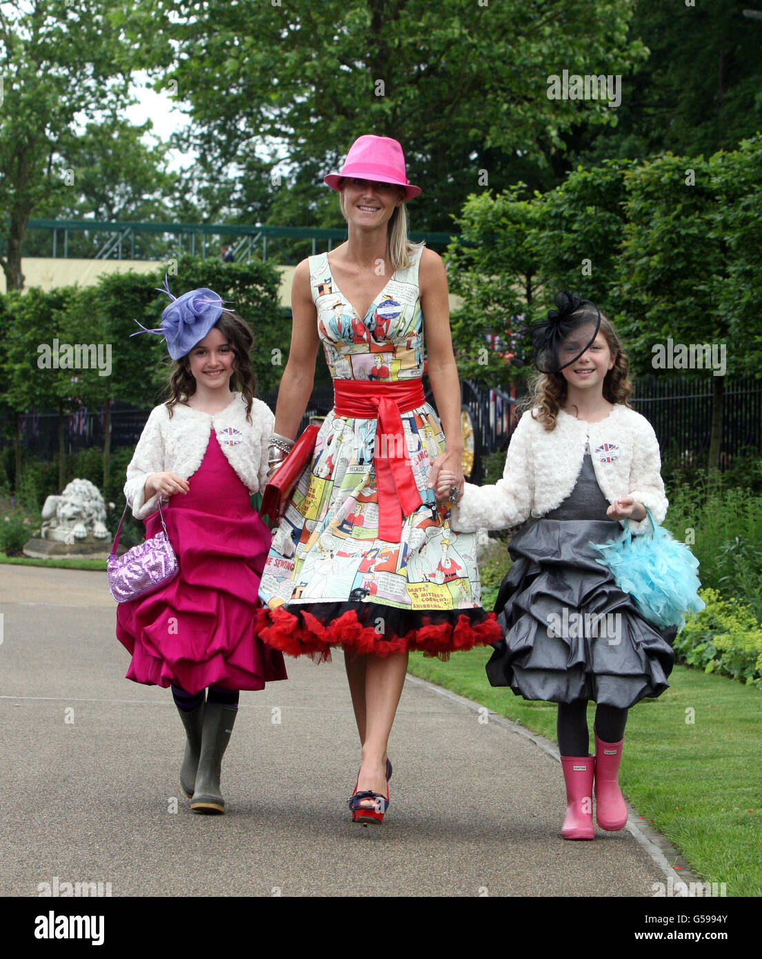 Elizabeth Blake-Thomas from Richmond walks with her Daughters Isabella and Cassandra aged (9) during day four of the 2012 Royal Ascot meeting at Ascot Racecourse, Berkshire. Stock Photo