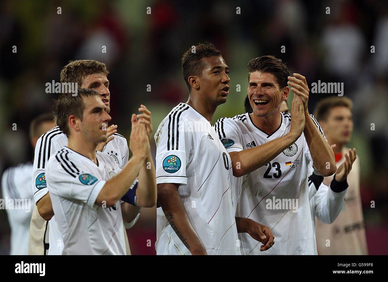 Soccer - UEFA Euro 2012 - Quarter Final - Germany v Greece - Arena Gdansk. Germany's Mario Gomez (right) celebrates with his team-mates after the game Stock Photo
