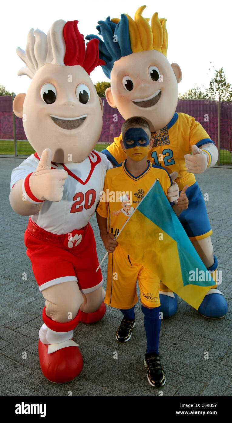 Soccer - UEFA Euro 2012 - Group D - England v Ukraine - Donbass Arena. Euro 2012 mascot with young Ukraine fan Stock Photo