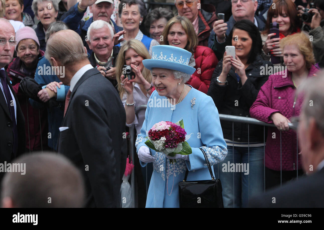 Queen Elizabeth II and the Duke of Edinburgh arrive at St. Macartin's Cathedral in Enniskillen, County Fermanagh, during a two-day visit to Northern Ireland as part of the Diamond Jubilee tour. Stock Photo