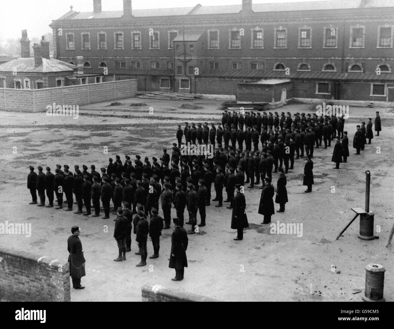 A parade by young inmates at Feltham borstal institution, West London. Stock Photo