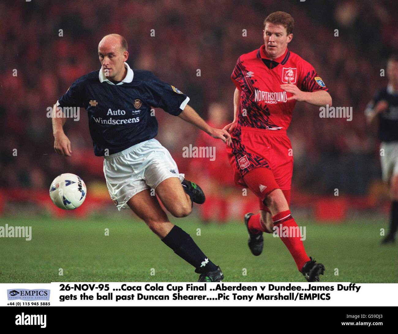 26-NOV-95, Coca Cola Cup Final ..Aberdeen v Dundee. Neil Duffy gets the ball past Duncan Shearer Stock Photo