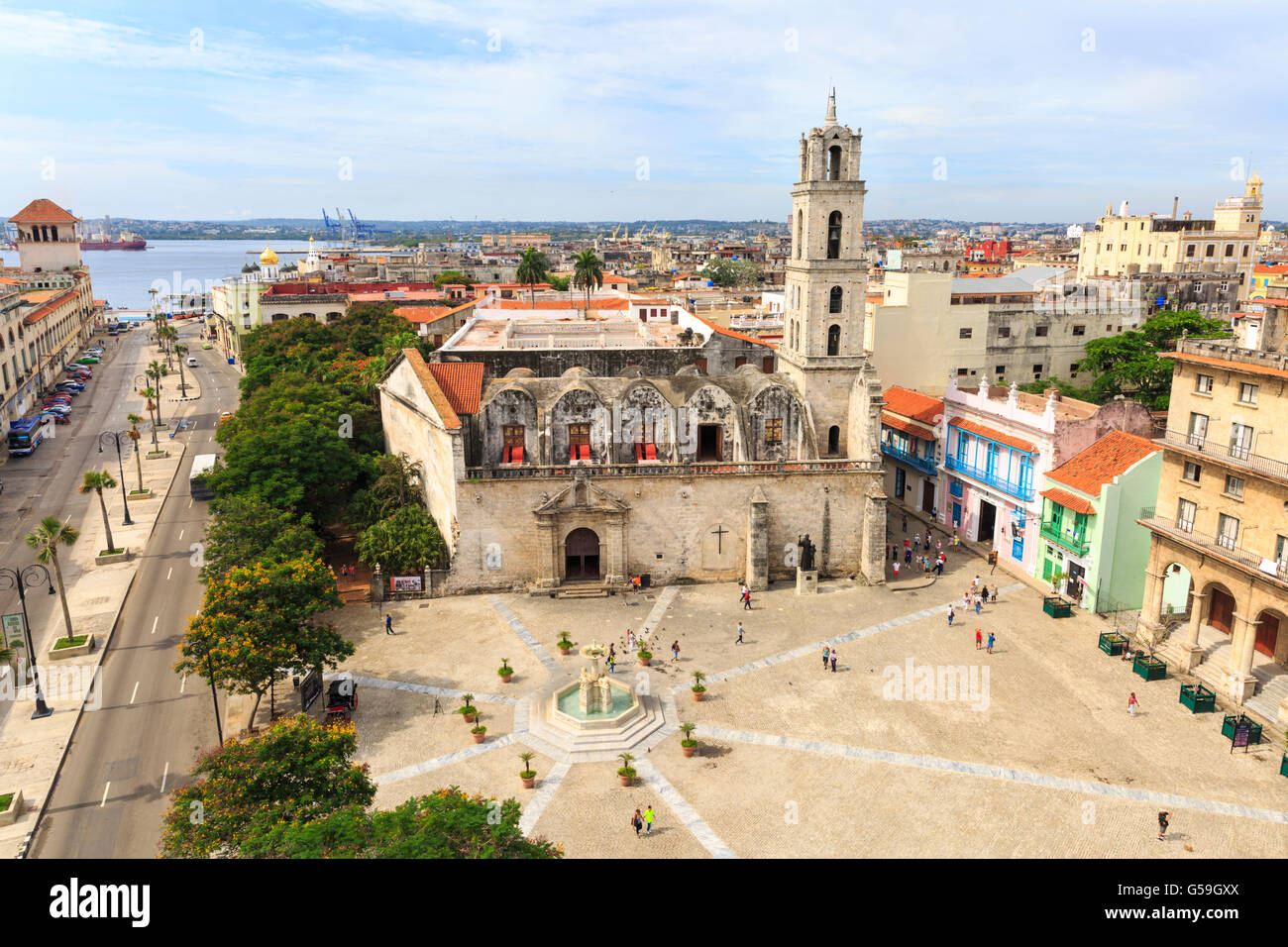 View across Plaza San Francisco de Asis Square and church towards the sea, La Habana Vieja, Havana, Cuba Stock Photo
