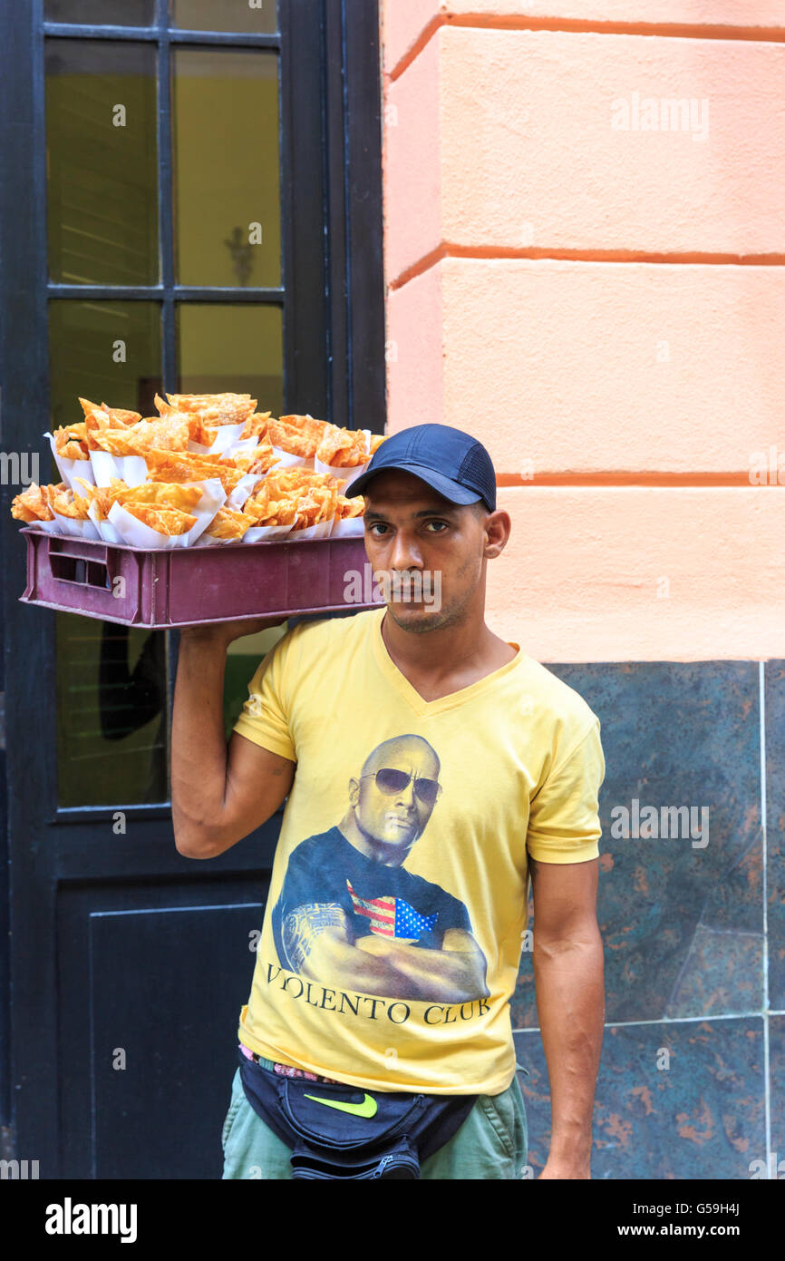 Street food vendor carrying snacks in Havana, Cuba Stock Photo