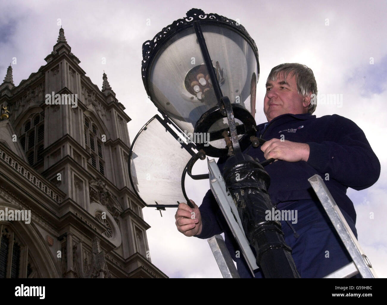 Phil Banner a lamplighter in London, checks a gas lamp outside Westminster Abbey, central London. Union leaders have re-ignited a pay claim for workers who maintain gas lamps dating back to 1765. * A bright spark at the GMB union discovered that a claim for one farthing submitted by the Careful Society of Lamplighters 236 years ago had not been settled. The union, which represents four workers who still light and maintain gas lamps outside Buckingham Palace in London and in the capital's Royal Parks, has written to British Gas about the "outstanding" grievance. Stock Photo