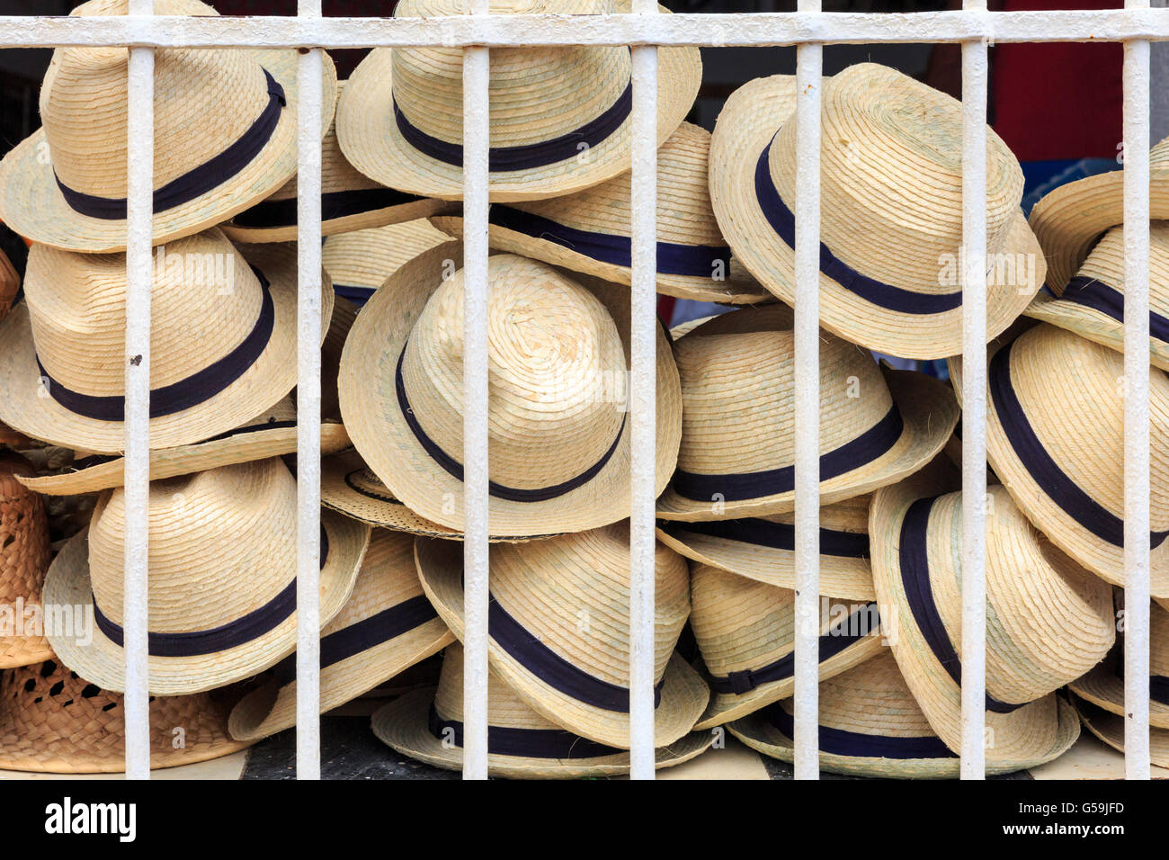 Cuban Fedora style straw hats on display in Trinidad, Cuba Stock Photo