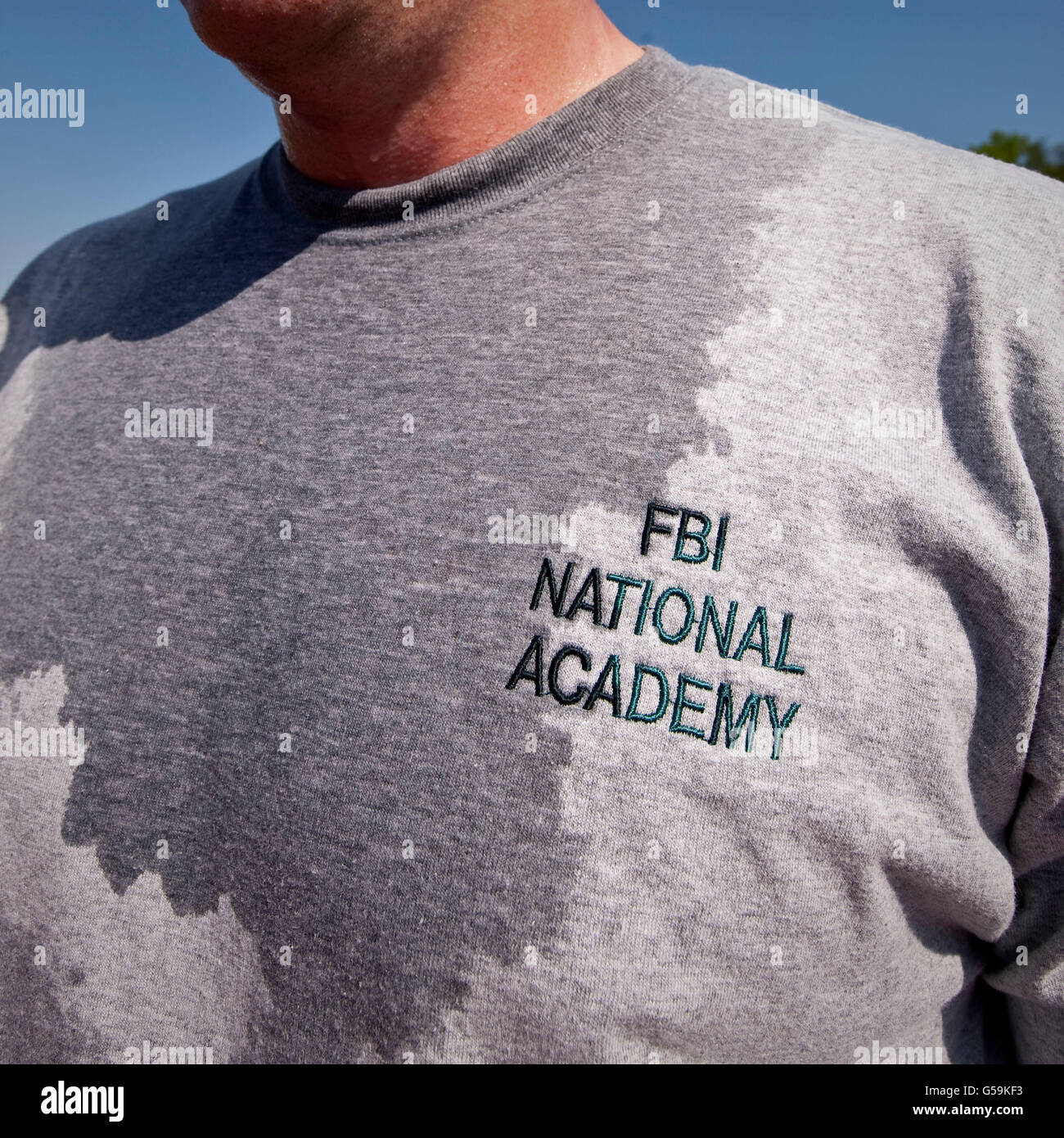 A police officer poses after exercising at the FBI National Academy in Quantico, VA, USA, 12 May 2009. Stock Photo