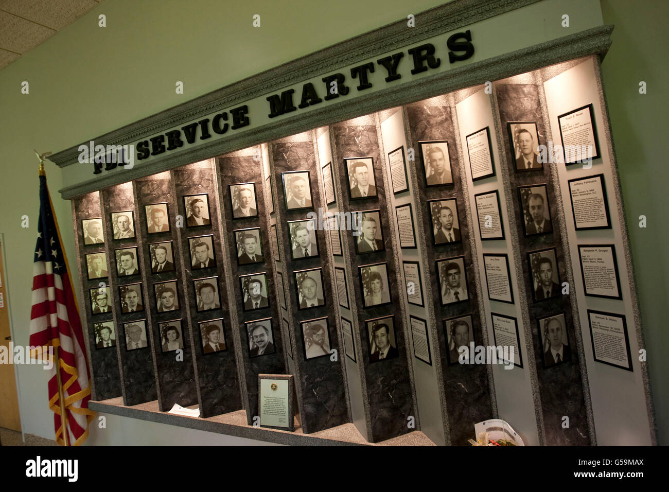 View of a wall of photographs commemorating dead agents at the FBI Academy in Quantico, VA, USA, 12 May 2009. Stock Photo