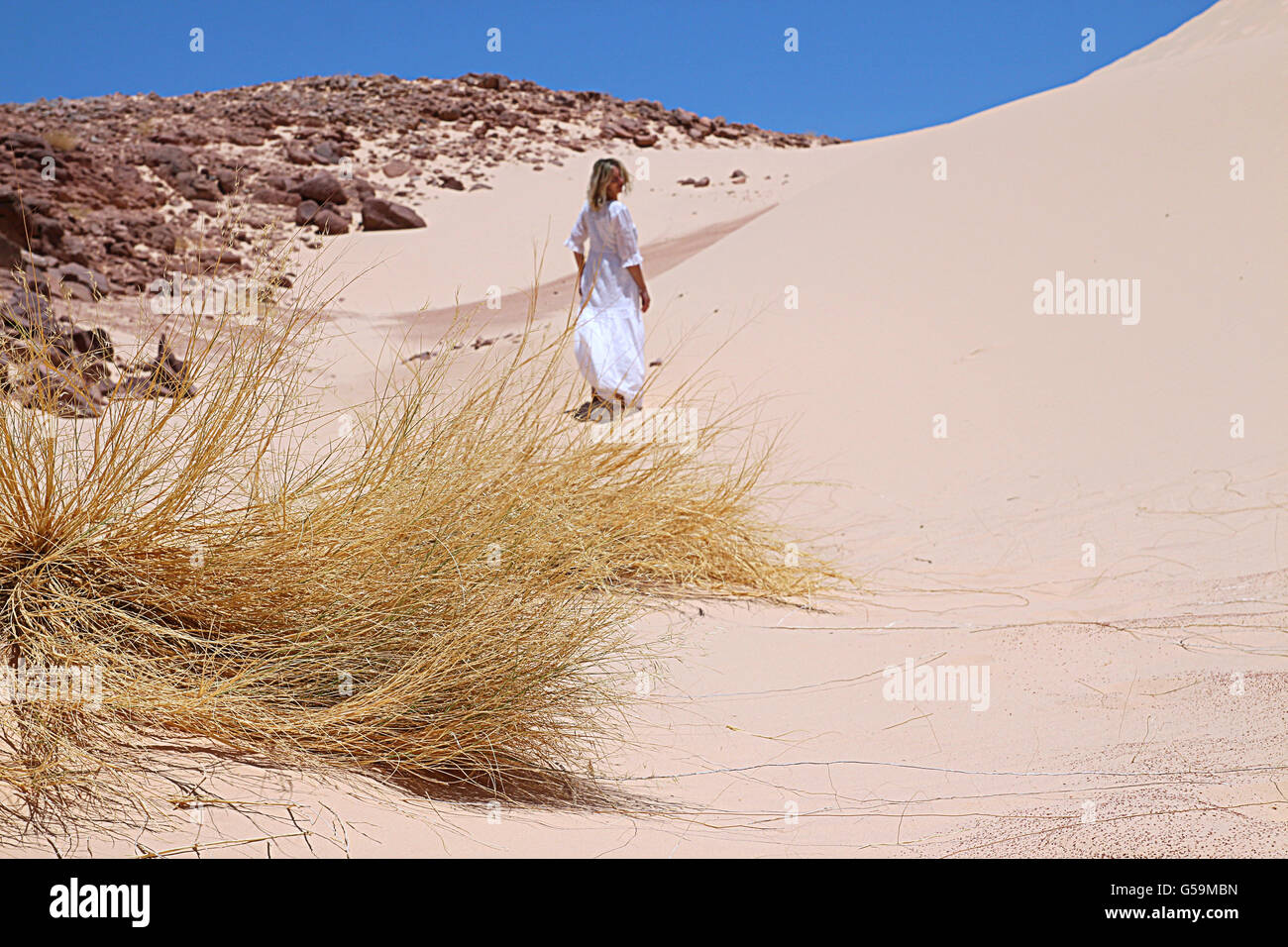 Barefoot woman in desert hi-res stock photography and images - Alamy