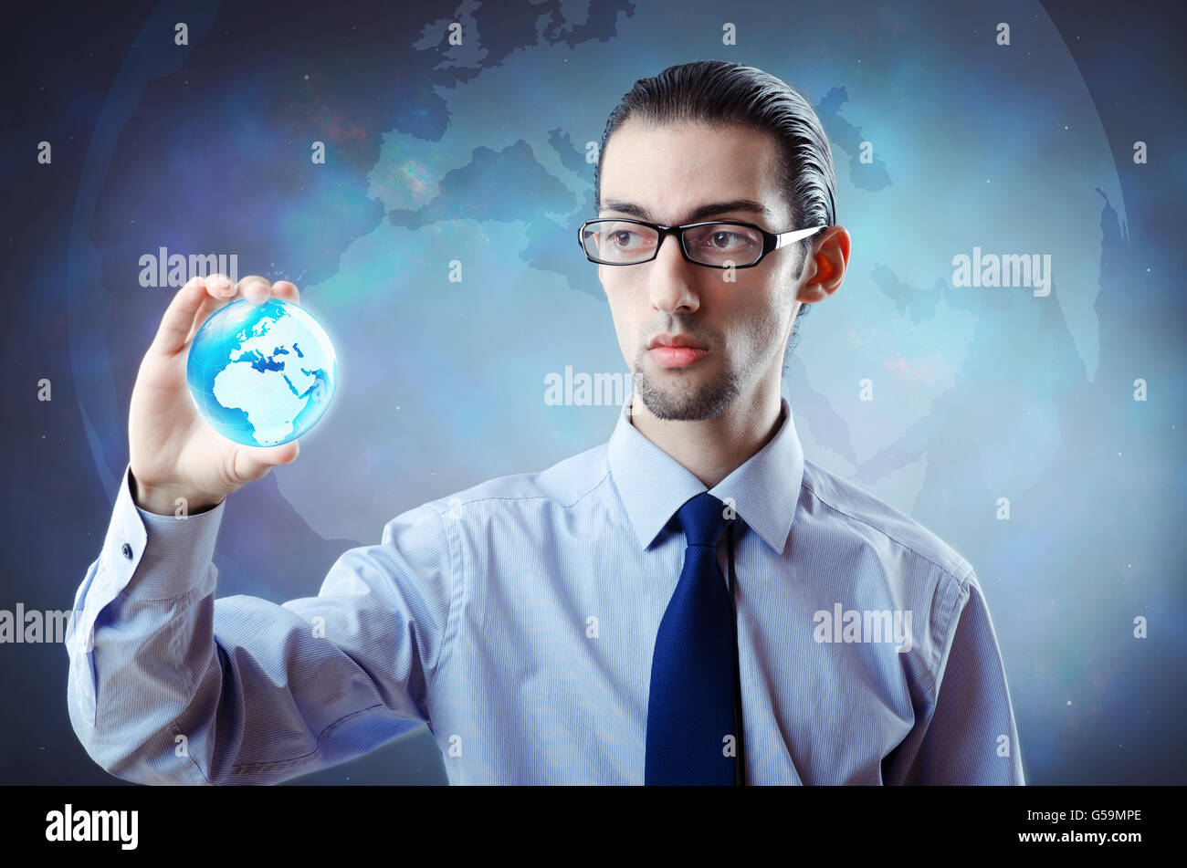 Businessman holding earth in global concept Stock Photo - Alamy