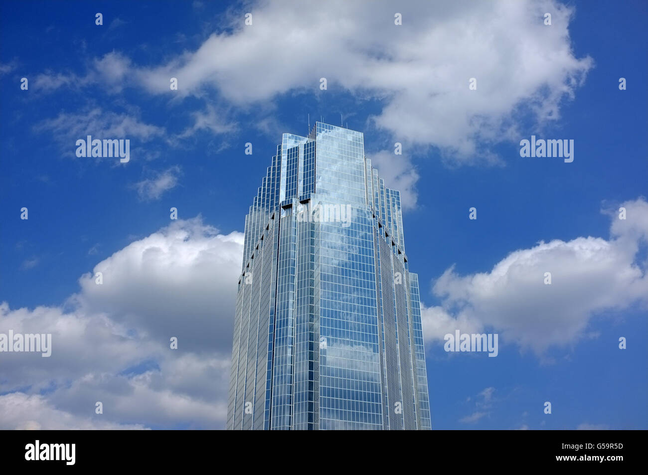 The top of the 113.4 meter tall One London Place building in London, Ontario, Canada. Stock Photo