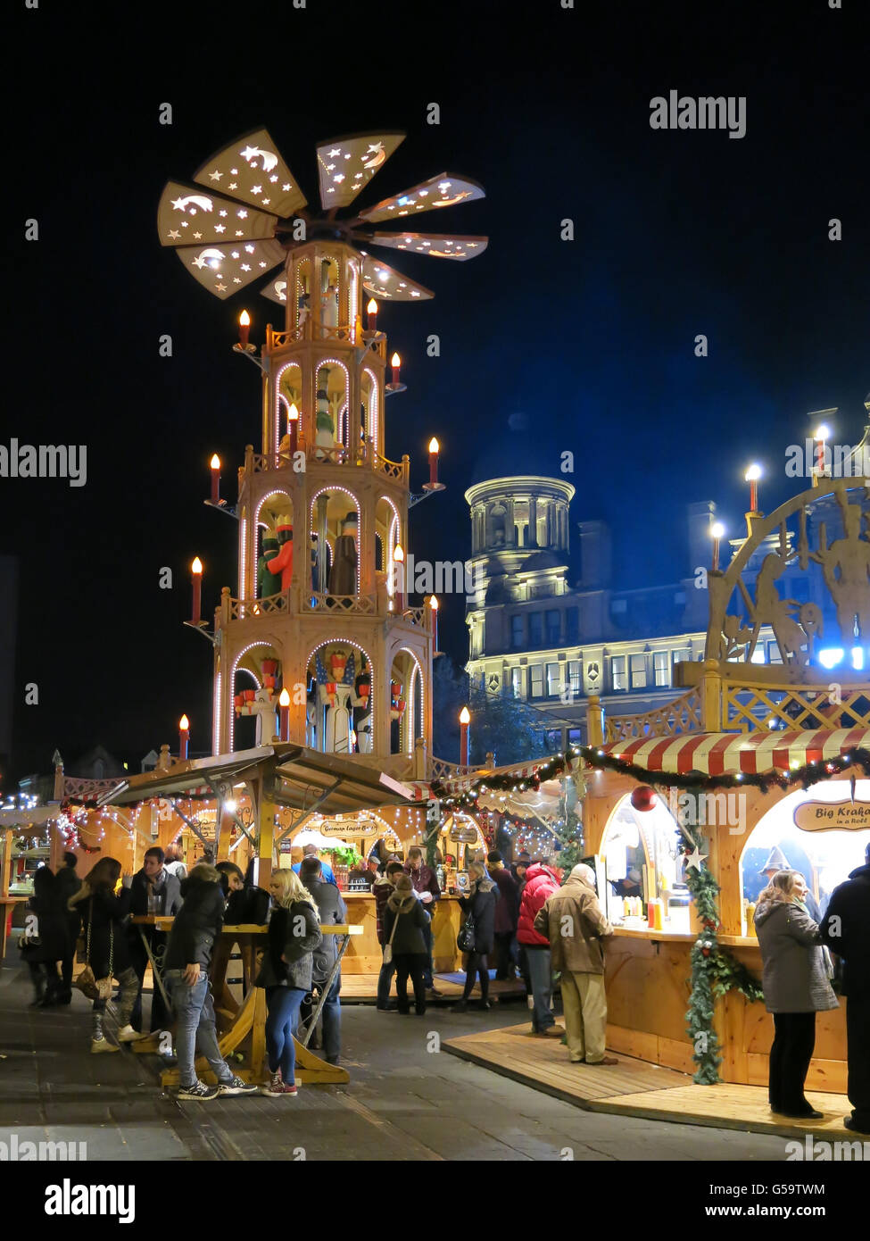 Night scene with people on Christmas Market in Manchester, England, United Kingdom Stock Photo