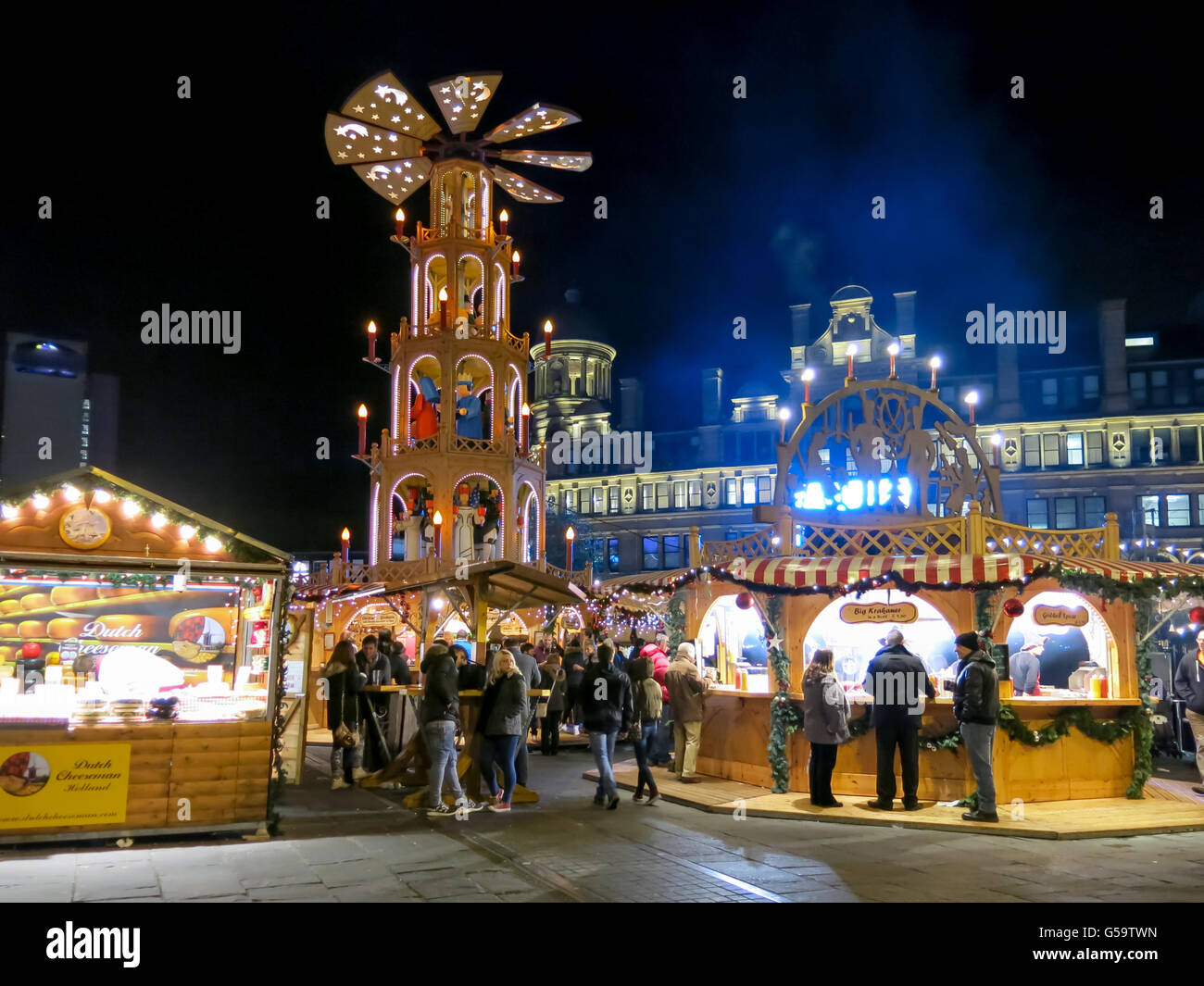 Night scene with people on Christmas Market in Manchester, England, United Kingdom Stock Photo