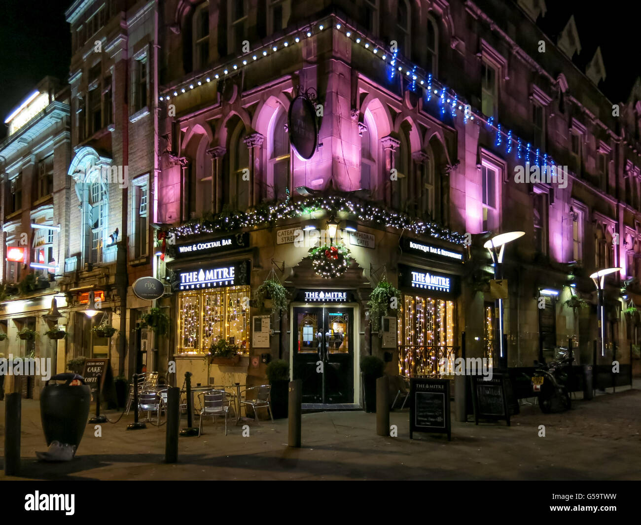 The Mitre Bar at Shambles Square by night in the city centre of Manchester, England, UK Stock Photo