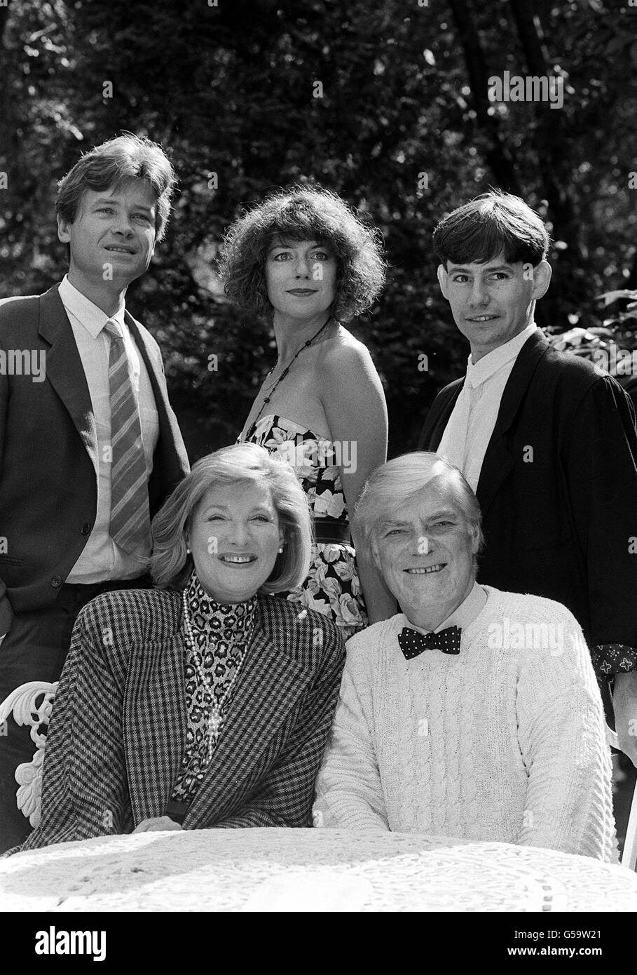 The main stars of 'The Bretts', a 11 part saga from Central Television set in the roaring twenties, which follows the fortunesand failures of an illustrious theatrical family and their house servants. Norman Rodway (seated right) stars as Charles Brett, Barbara Murray (seated) plays his wife Lydia Wheatley; they have five children, including (from left) twins Edwin (David Yelland) and Martha (Belinda Lang); and Thomas (George Winter.) Stock Photo
