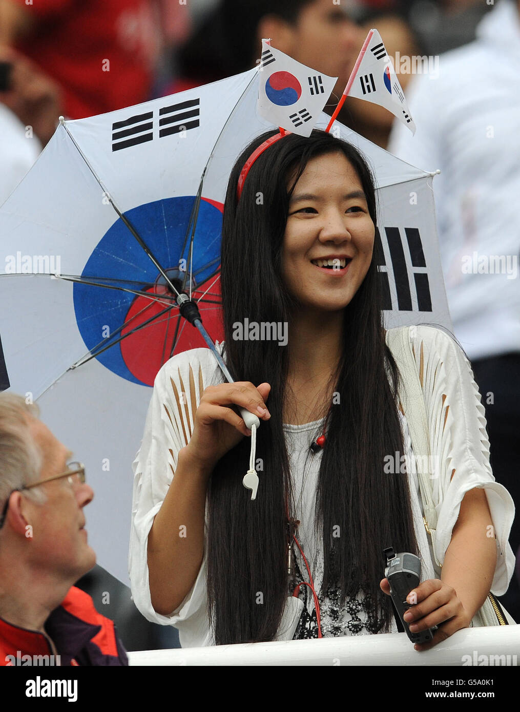 A South Korea Fan In The Stands Before Kick Off During The Mexico V a-south-korea-fan-in-the-stands-before-kick-off-during-the-mexico-v