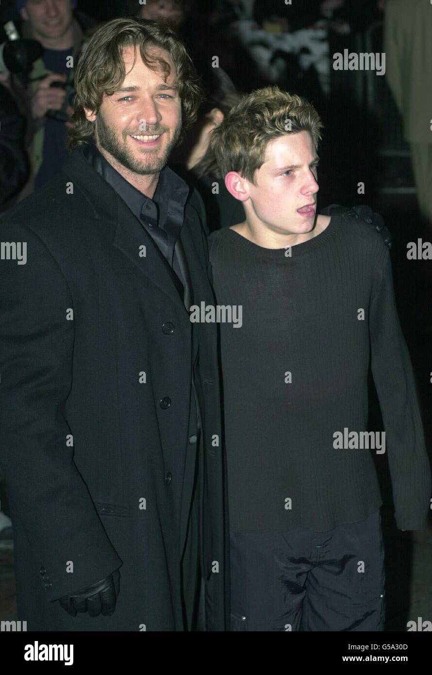New Zealand actor Russell Crowe (left), with British actor Jamie Bell, arriving for the premiere of 'Proof of Life' at the Warner West End in London's Leicester Square. Stock Photo