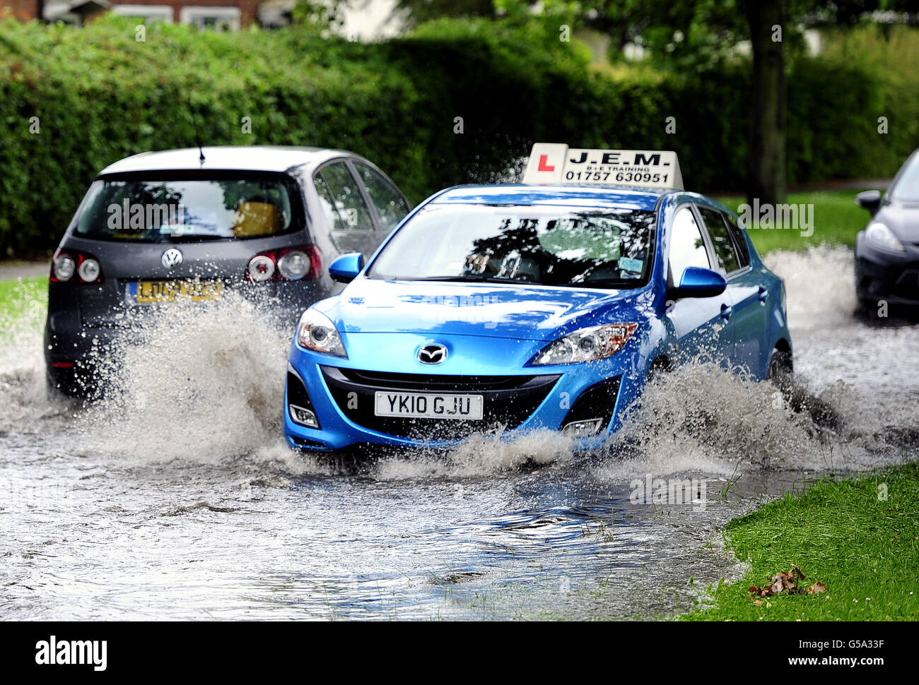 Flooded roads in the York area following torrential rain today. Stock Photo