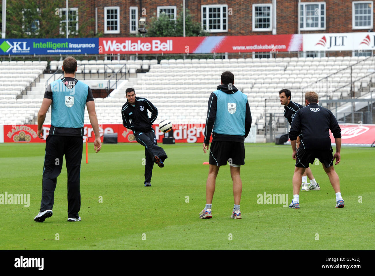 Surrey Lions' Kevin Pietersen warms up by playing football Stock Photo