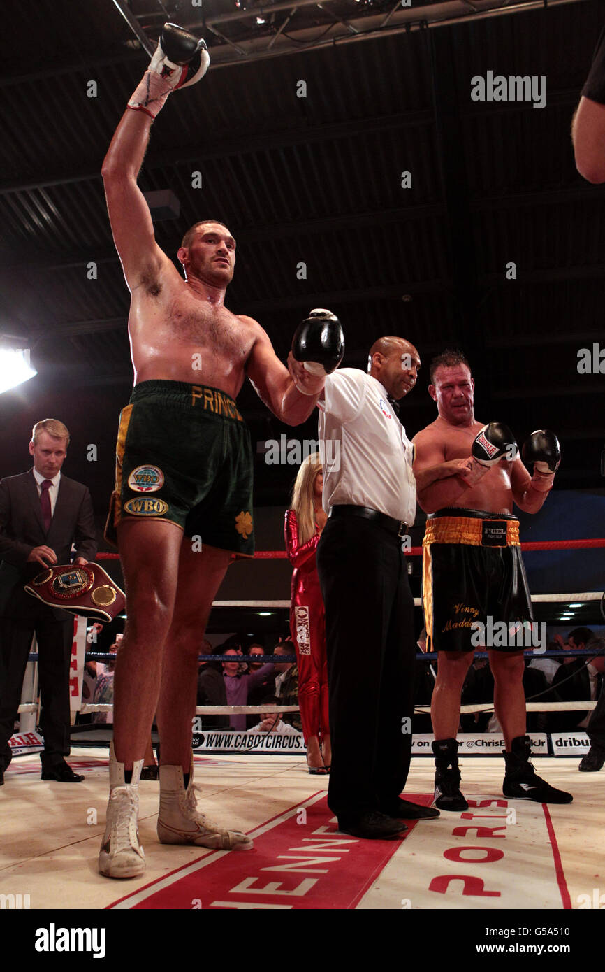 Tyson fury celebrates beating vinnie maddalone at the hand arena