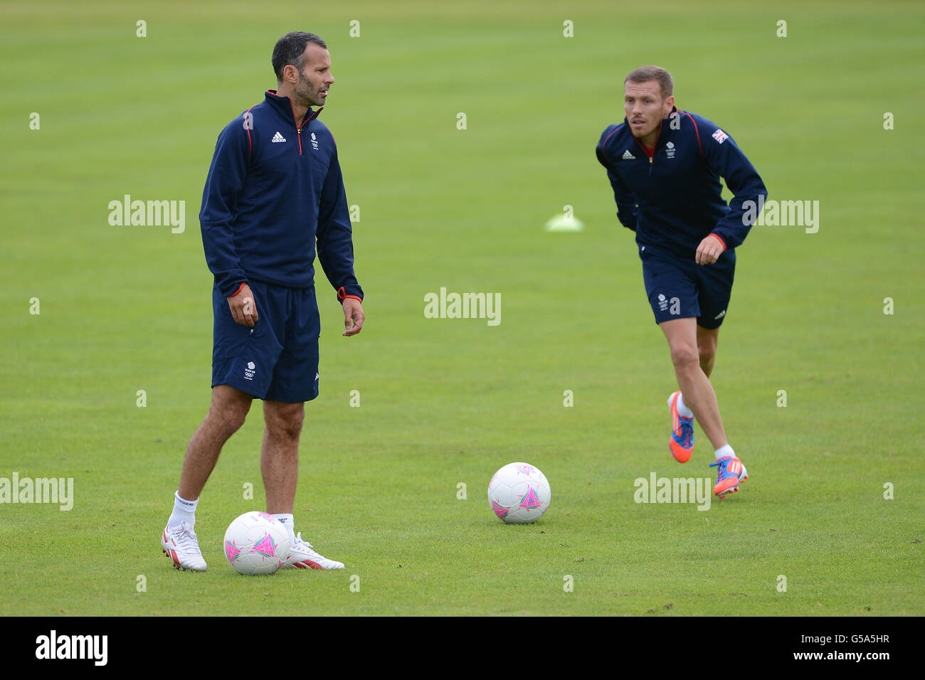 Ryan Champney Great Britain captain Ryan Giggs and Craig Bellamy (right) during a ...