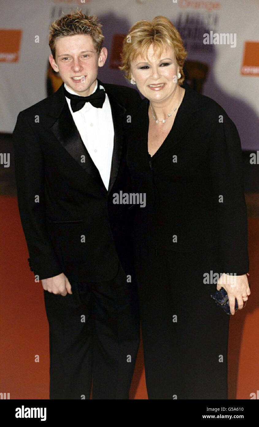 Billy Elliot stars, actress Julie Walters and actor Jamie Bell attending The Orange British Academy Film Awards at the Odeon cinema, in London's Leicester Square. Julie's suit is by Armani. Stock Photo