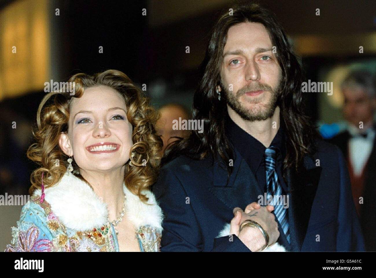 Goldie Hawn's daughter, actress Kate Hudson with her husband, singer Chris Robinson of rock group the Black Crowes, during The Orange British Academy Film Awards at the Odeon in London's Leicester Square. The ceremony has been brought forward several weeks from previous years to give it a more prominent position in the film calendar. Stock Photo