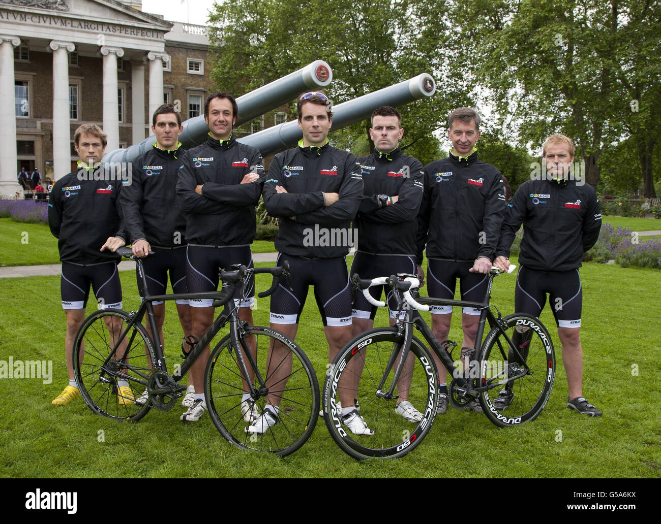 Television adventurer Mark Beaumont (centre) reveals the cycle team - (from left to right) wounded soldier Rupert 'Rab' Smedley, Peter Latham, wounded soldier Mike Westwell, Mark Beaumont, wounded soldier Don Maclean, Simon Oldfield and wounded soldier Craig Preece - who he will be leading during the Trois Etapes cycle race in France to raise funds for Walking With The Wounded, at the Imperial War Museum in London. Stock Photo