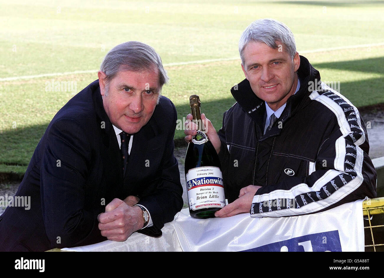 Following five straight wins Hull City manager Brian Little (R) receives his Nationwide Division Three Manager of the Month award for February 2001 from former referee Jack Taylor. * He has steered the club away from the relegation zone and was pushing the team towards the top eight despite the club's financial problems. Stock Photo