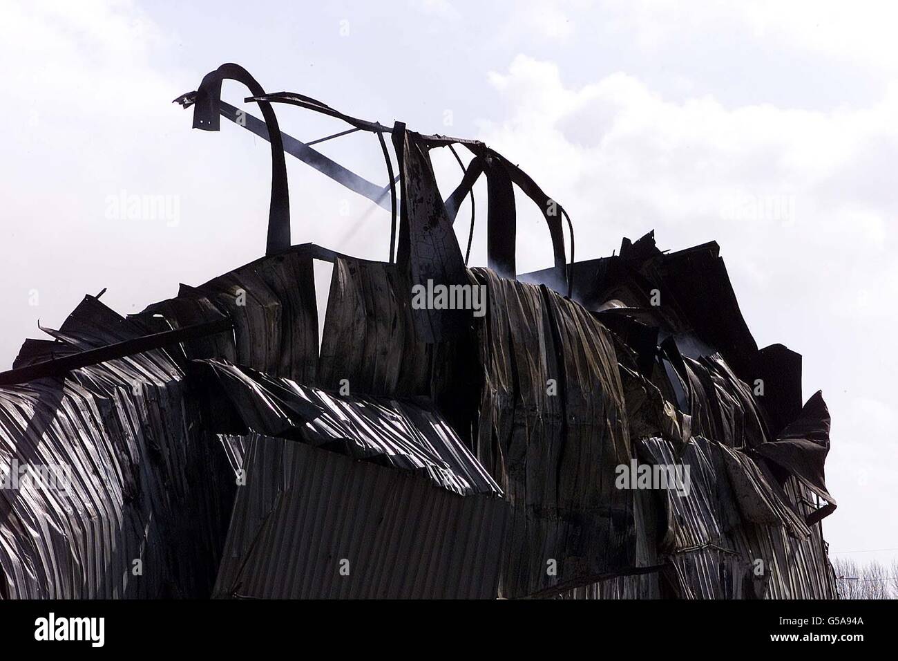 The burnt out shell a warehouse in the Ideal World shopping channel ...