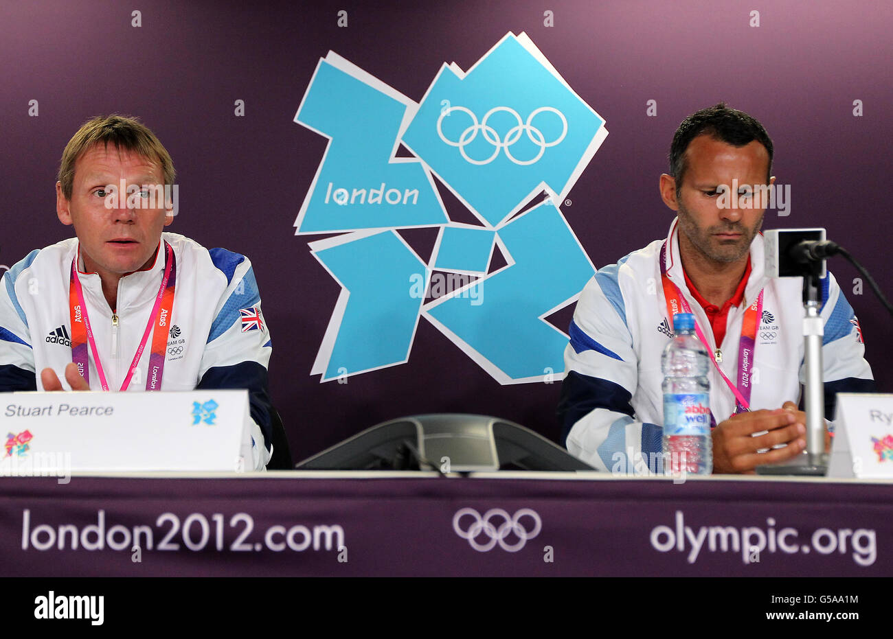 Great Britain's Ryan Giggs and coach Stuart Pearce during a press conference at the Olympic Park, London. Stock Photo