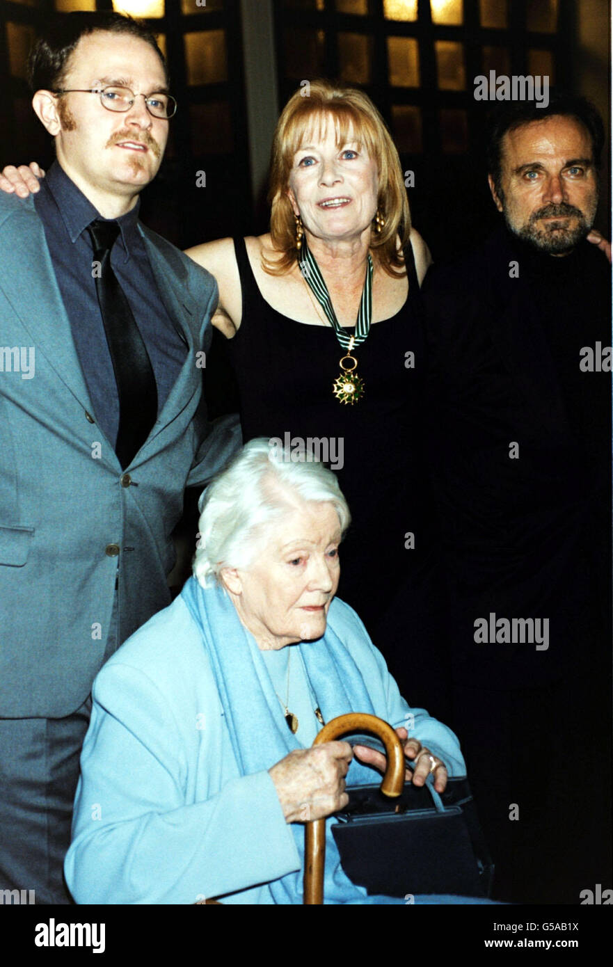Carlo Nero (left, son of Vanessa and Franco) with Vanessa Redgrave (centre), actor Franco Nero (right) and Vanessa's mother (sitting), Lady Redgrave, at the ceremony where Vanessa was awarded the Insignia Officier de l'Orde des Arts et des Lettres. * ...by French Amabassador Daniel Bernard on behalf of the French government at the Institut Francais, in London. Stock Photo