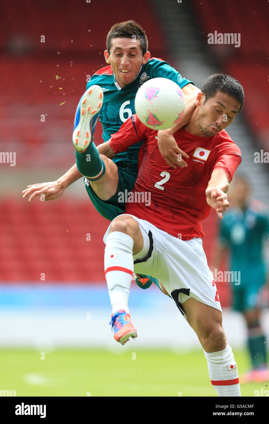 Soccer - Under 23 International Friendly - Japan v Mexico - City Ground. Japan's Yuhei Tokunaga and Mexico's Hector Herrera battle for the ball Stock Photo