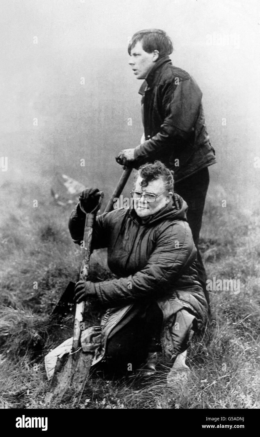 Mrs Winnie Johnson with her 23 year old son Joey, digging on Saddleworth Moor near Manchester in a bid to find the remains of her 12 year old son Keith Bennett, victim of the Moors Murderers Myra Hindley and Ian Brady. Stock Photo