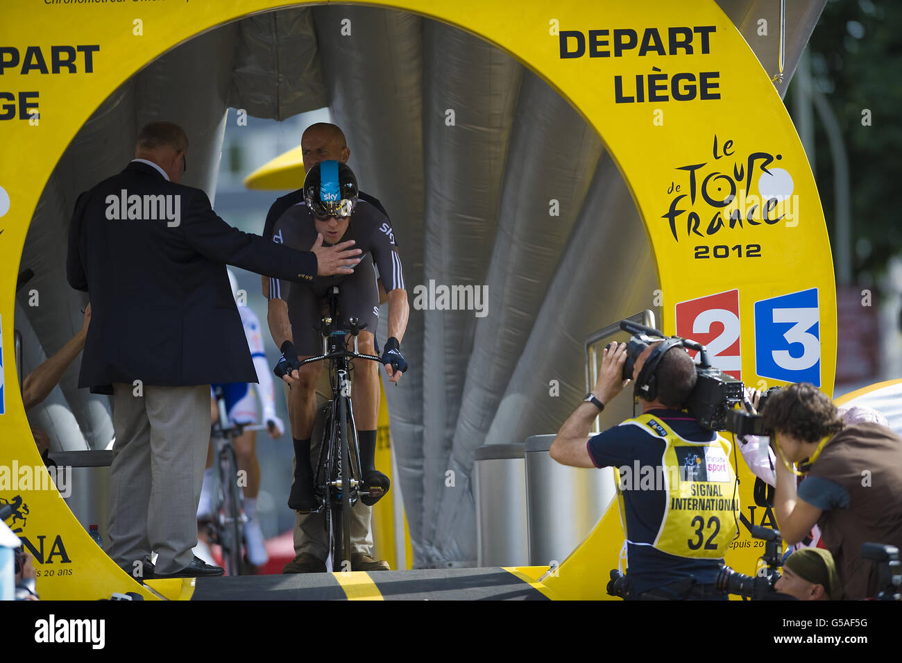 Cycling - 2012 Tour de France - Prologue Stage - Liege. Bradley Wiggins is counted down off the starting ramp during the Prologue Stage of the 2012 Tour de France in Liege, Belgium. Stock Photo