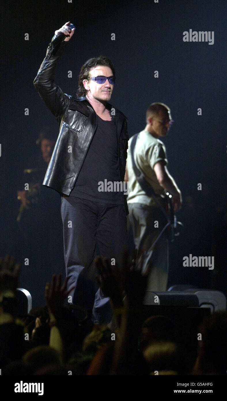 Bono from the Irish rock band U2 perform during The Brit Awards 2001, at Earls Court in London. Stock Photo