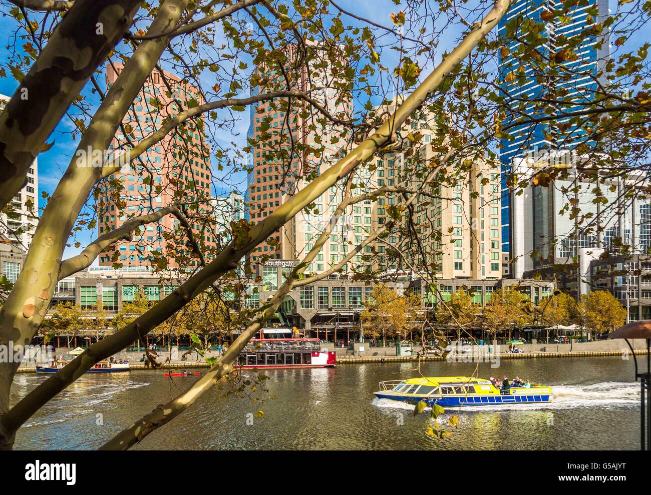 Views of boats, restaurants and shops along the Yarra River in Melbourne, Australia Stock Photo
