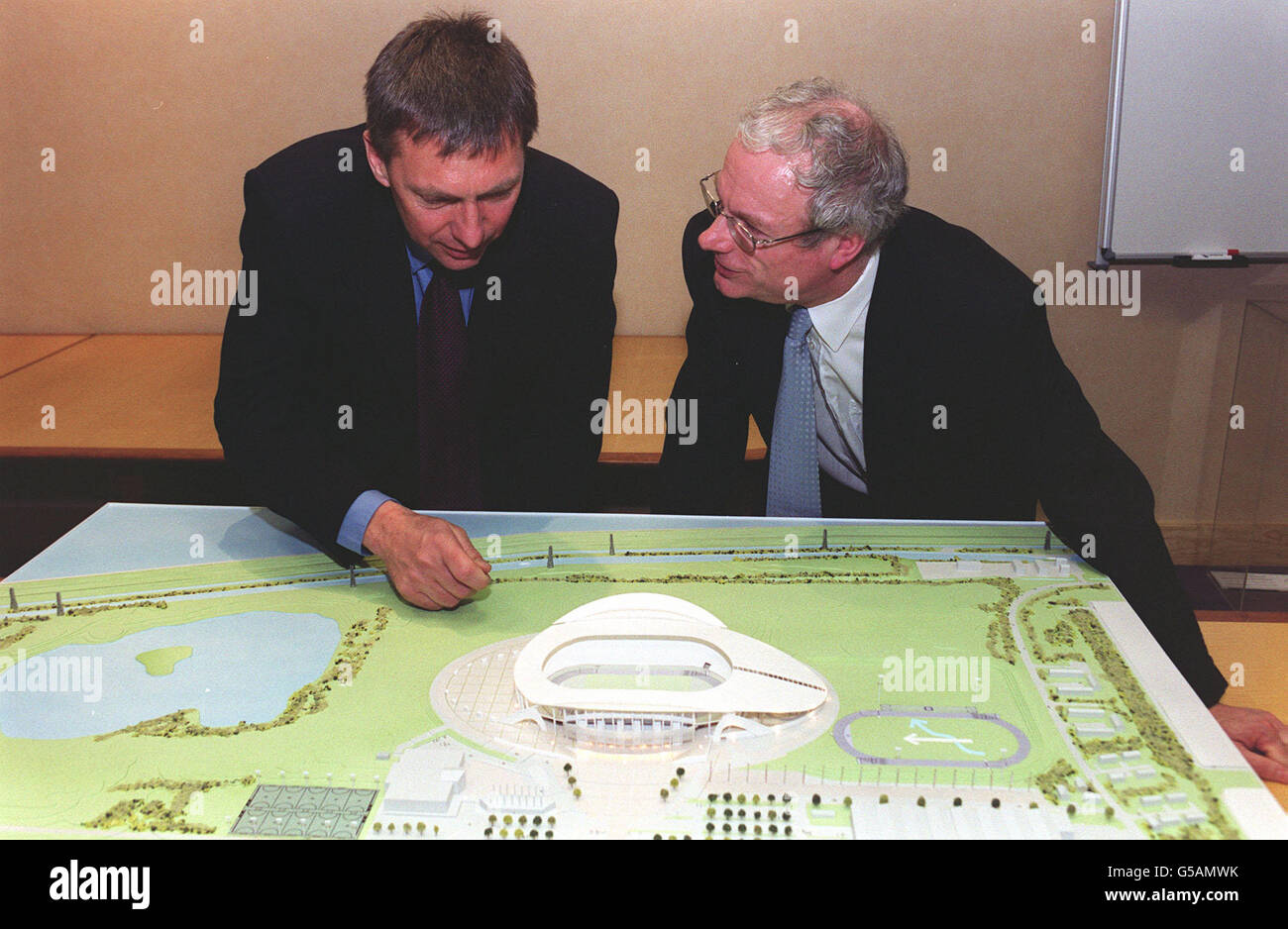 Secretary of State for Culture, Media and Sport, Chris Smith MP (right), and UK Athletics Chief Executive, David Moorcroft, look at a scale model of the Lee Valley National Athletics Centre in Picketts Lock, north London. * Further details of the centre, which will host the 2005 World Athletics Championships, were unveiled at a press conference in London today. The complex will cost around 87million and seat 43,000 spectators. Stock Photo
