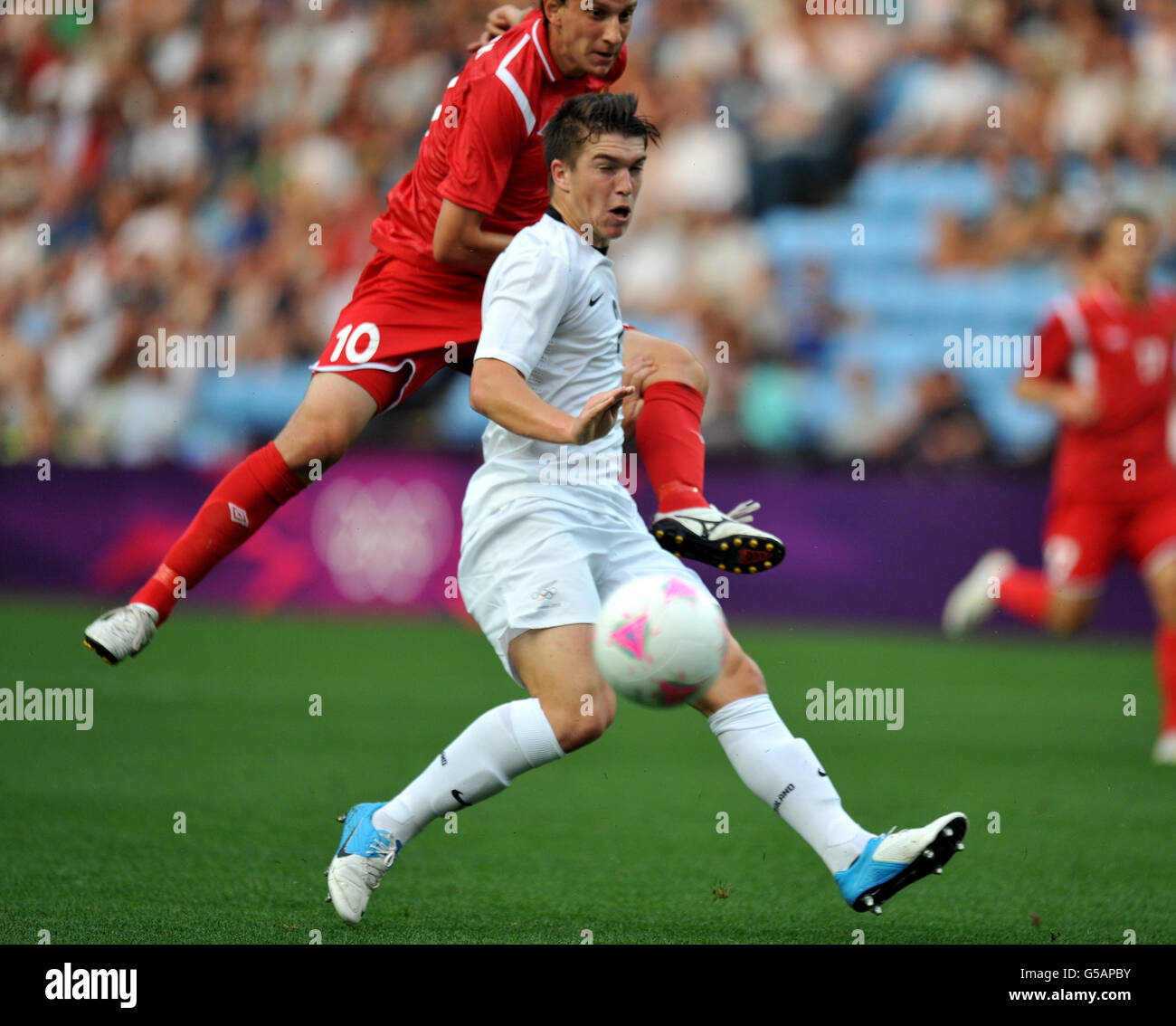 New Zealand s Tim Payne Blocks Belarus Renan Bressan Bardini During 