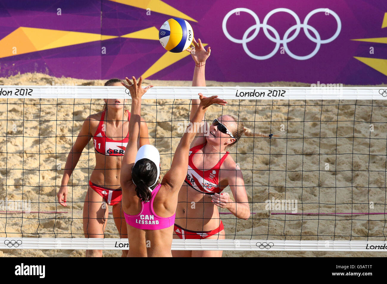 Canada's Marie-Andree Lessard (L) and teammate Annie Martin