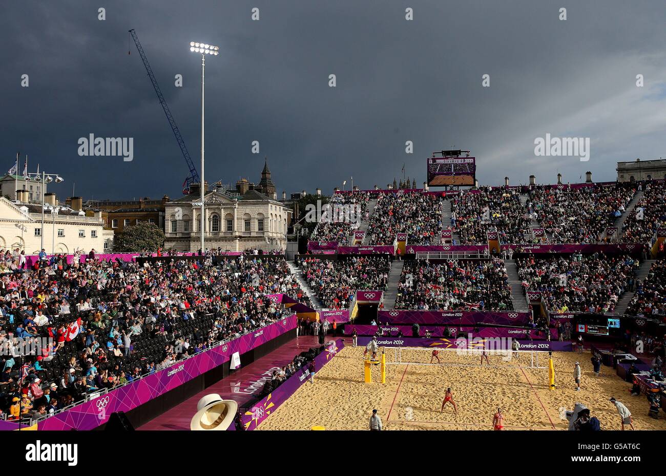 Great Britain's Shauna Mullin and Zara Dampney play the Canadian pair of Annie Martin and Marie-Andree Lessard watched by a large crowd at Horse Guards Parade, London. Stock Photo