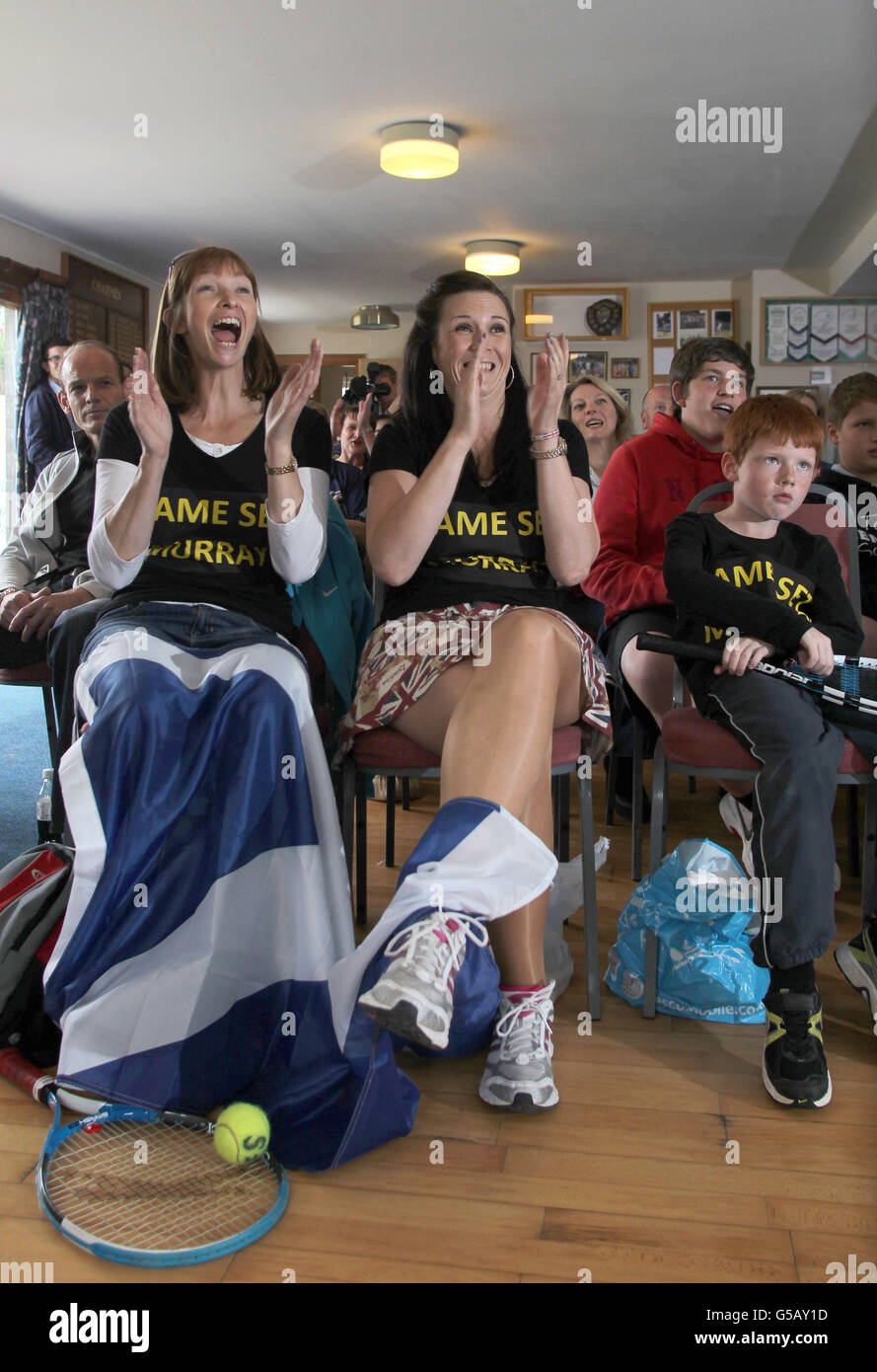 Dunblane Tennis club members Claire Sherriff (left) and Lynn Balman react to the match, as the streets in Andy Murray's home town are almost deserted as tennis fans gather to watch his bid to become the first British man to win Wimbledon in 76 years. Stock Photo