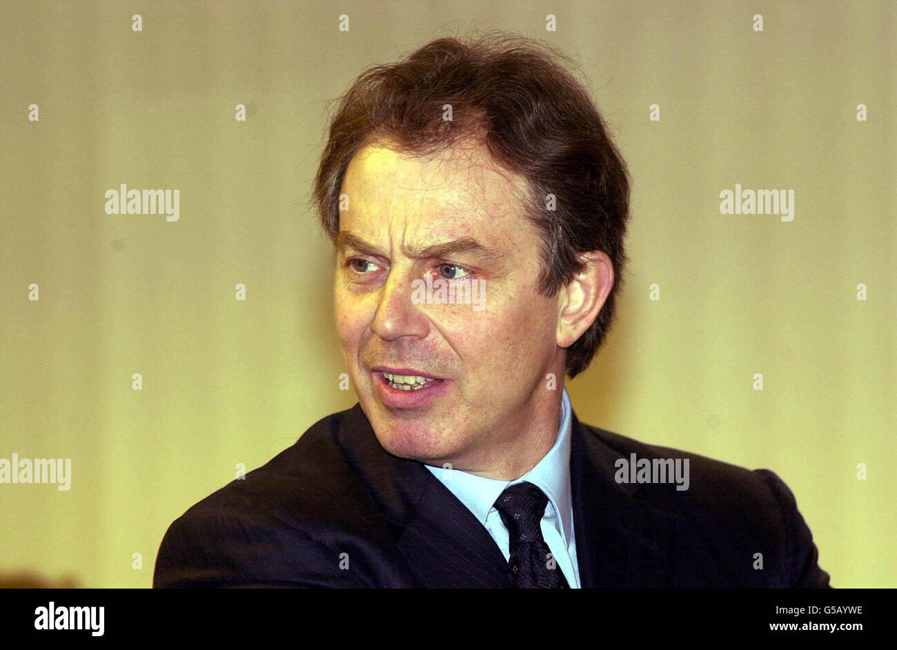 Britain's Prime Minister Tony Blair listens as Ministry of Agriculture